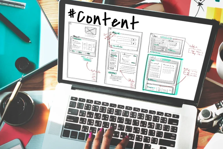 A photo of a laptop displaying a wireframe that shows different ways an original piece of content can be repurposed.