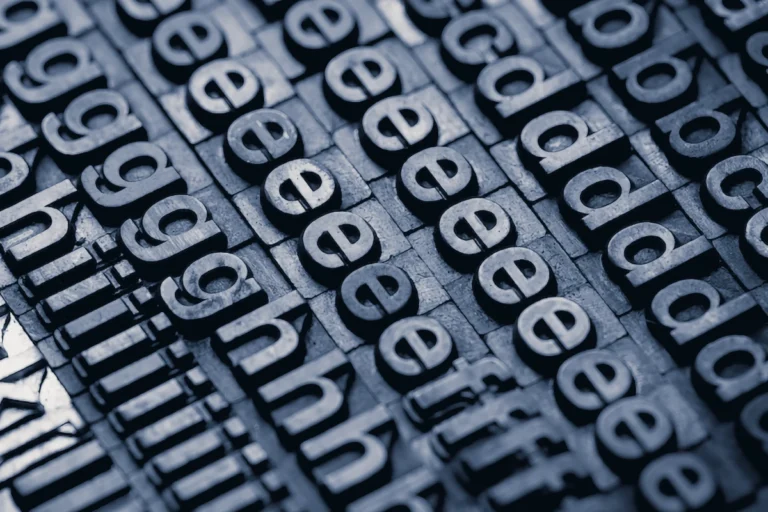 a photo of cast metal type pieces for a printing press. A form of typography